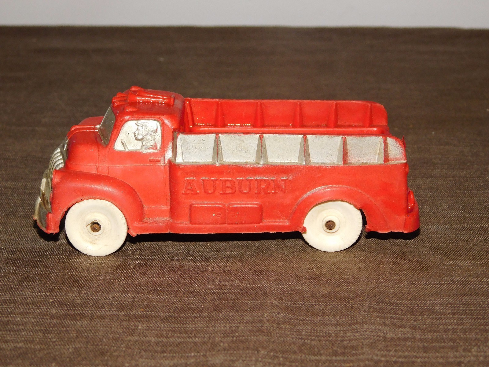 VINTAGE MADE IN USA TOY 5 1/2" LONG RUBBER PLASTIC AUBURN RED TRUCK
