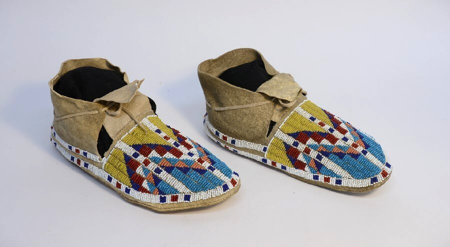 Antique Sioux Moccasins, painted parfleche interior soles