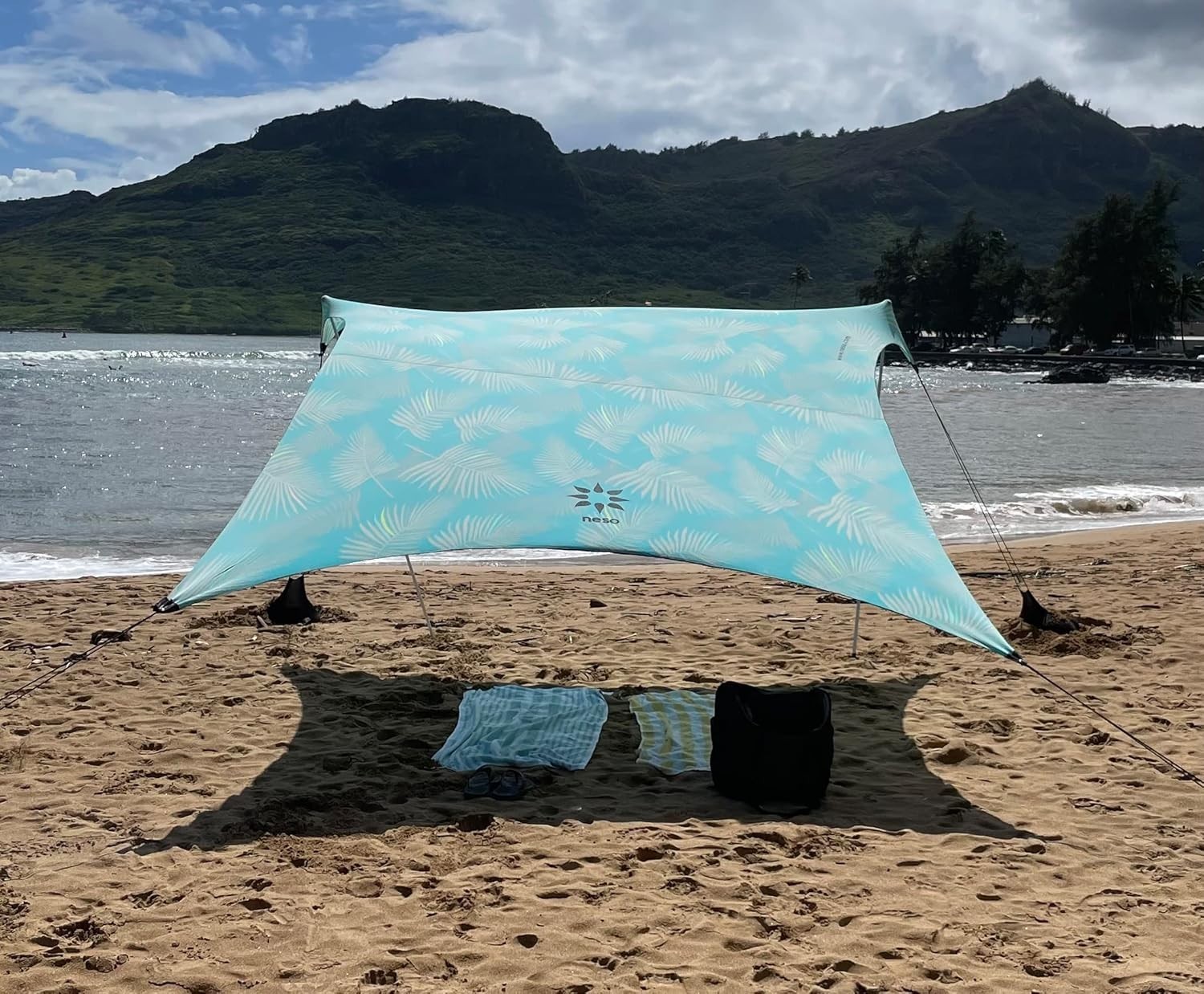 Neso Beach Tent w/ Sand Anchor, Portable Sunshade  9x9 (Aqua Fronds) Description