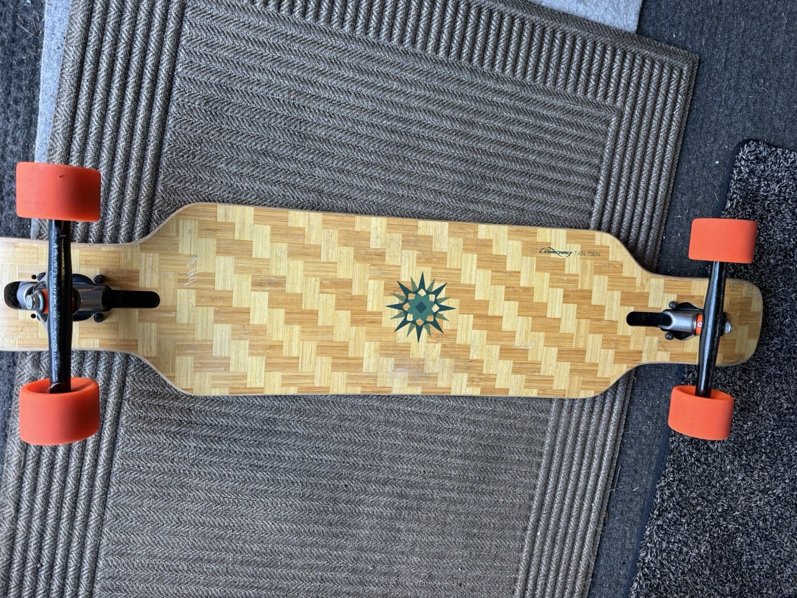 Loaded Tan Tien Drop Through Longboard Black Grip Tape Orange Wheels