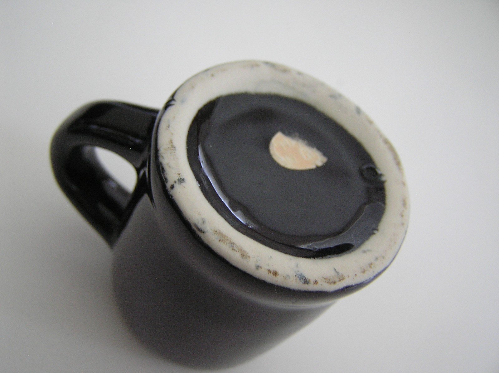 2 Souvenirs Shot Mugs: A Black Rumple Minze and A Clear Nashville 5cents Beer