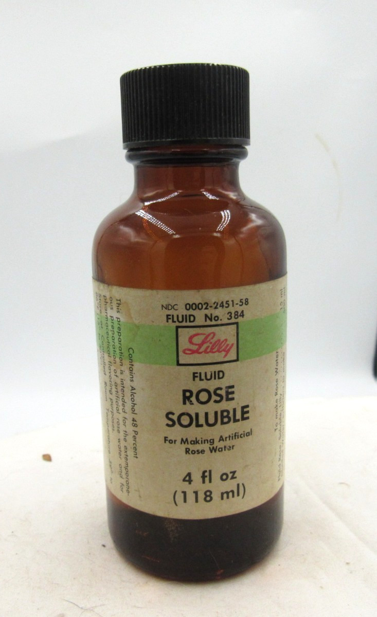 MM - 1980's Eli Lilly Rose Soluble Indianapolis Ind 4 7/8" Amber Medicine bottle