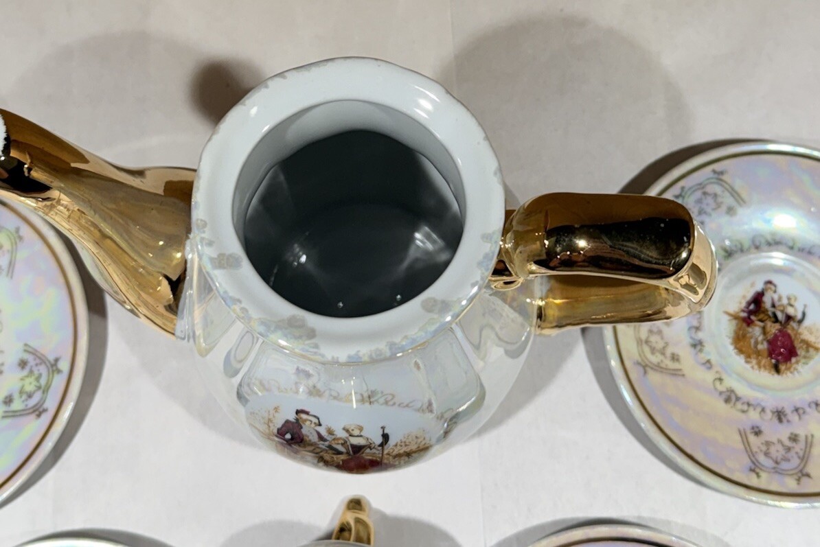 Romeo And Juliet Tea Pot 4 Tea Cups 4 Saucers Gold Trim Handles Iridescent White