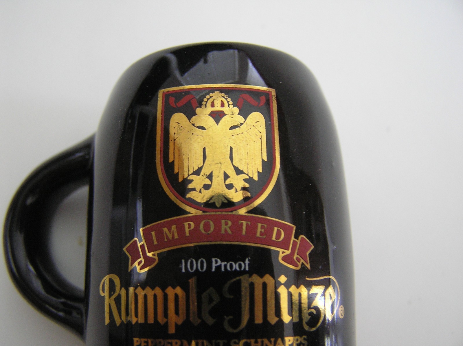 2 Souvenirs Shot Mugs: A Black Rumple Minze and A Clear Nashville 5cents Beer