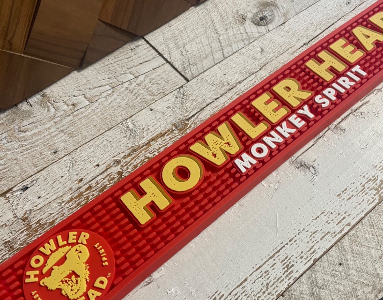 New Old Stock Howler Head Monkey Spirit Red Rubber Bar Tap Mat