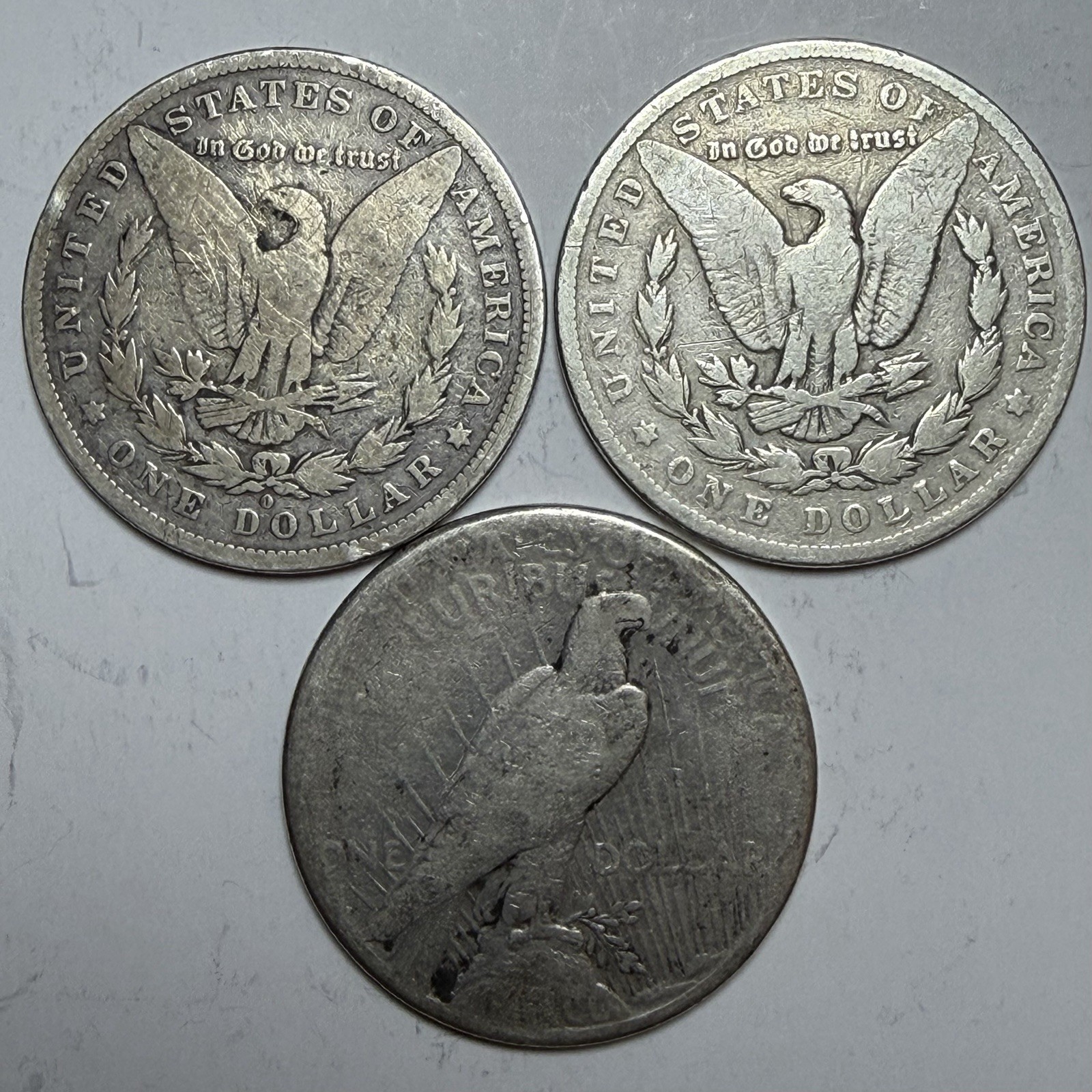 3 Silver Dollar Lot - 1881 O Morgan, 1883 Morgan, 1922 Peace