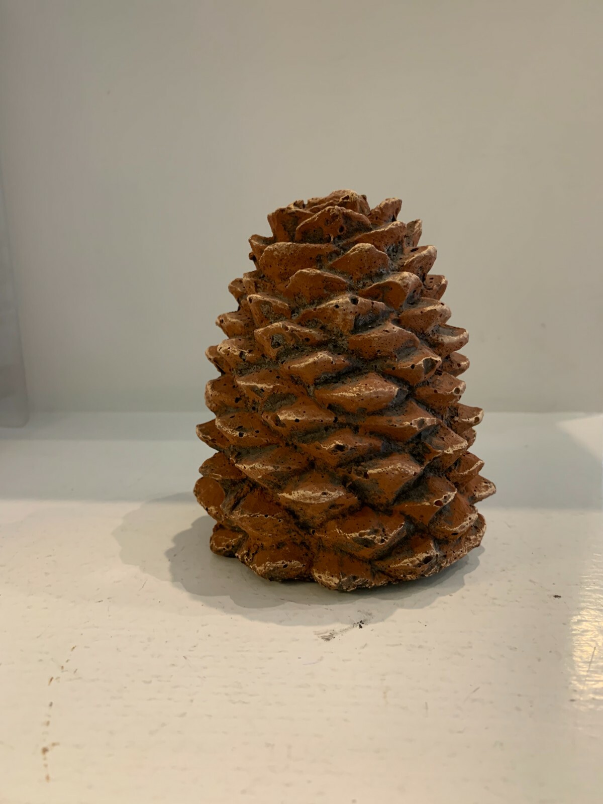 Large decorative ceramic Pine cones for gas log fireplaces.