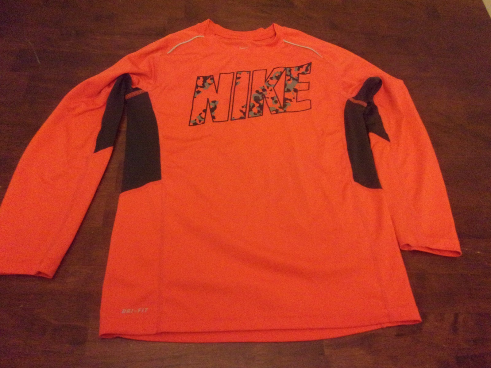Nike used youth medium long sleeve orange shirt dri fit fair shape