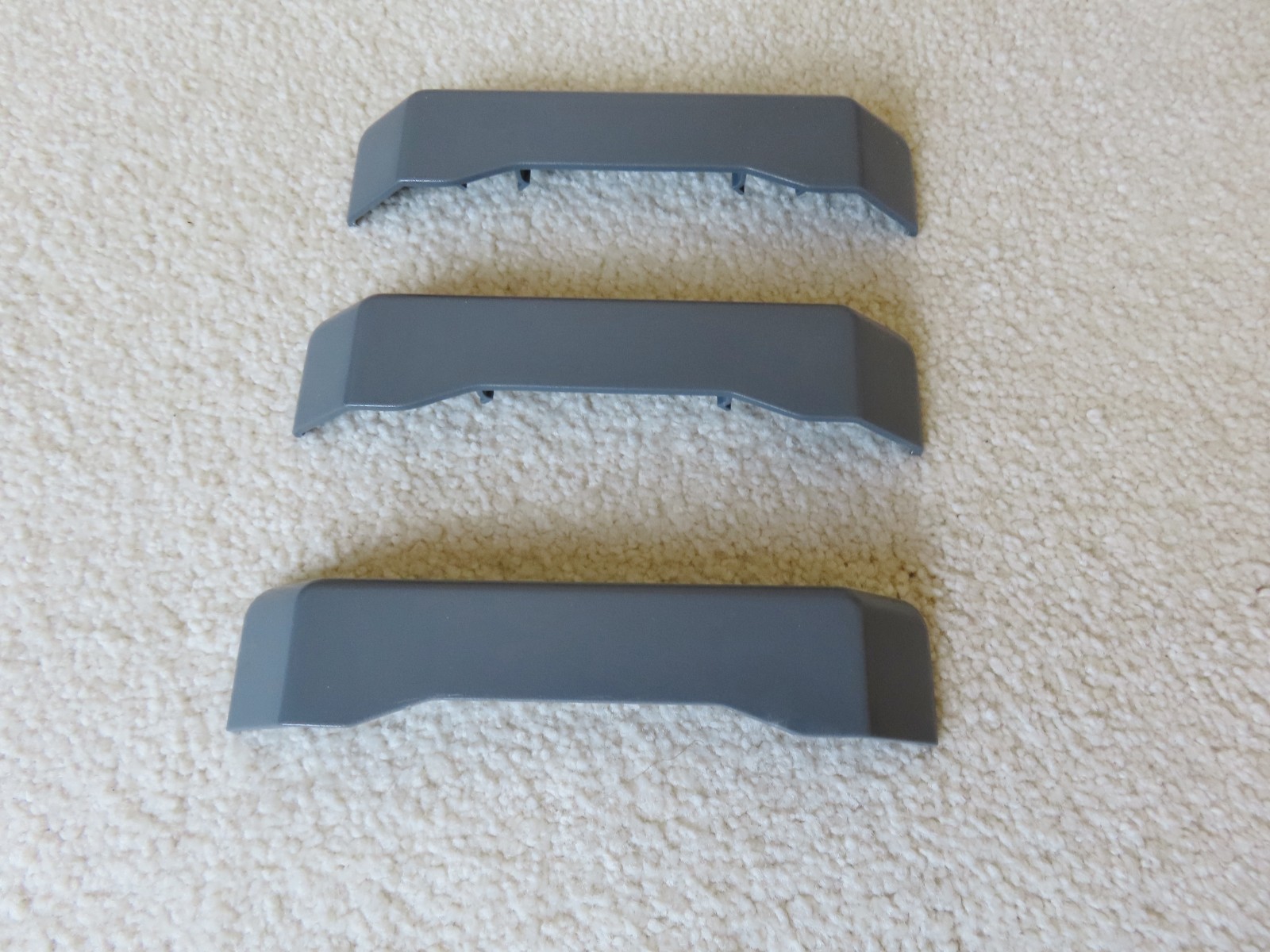 Open Box with Three (3) Individual Gladiator GearTrack Slide On End Caps