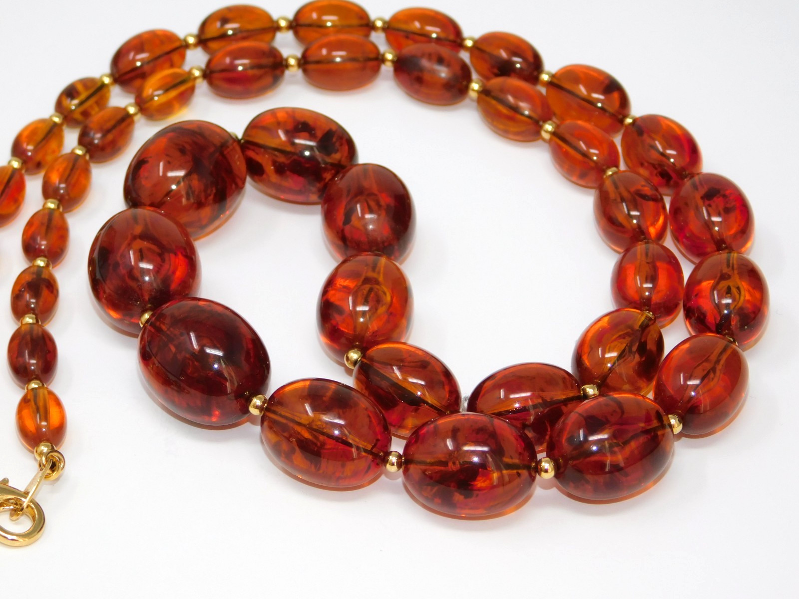 Vtg JOAN RIVERS Faux Amber Lucite Graduated Bead Necklace w/ Gold Tone Spacers