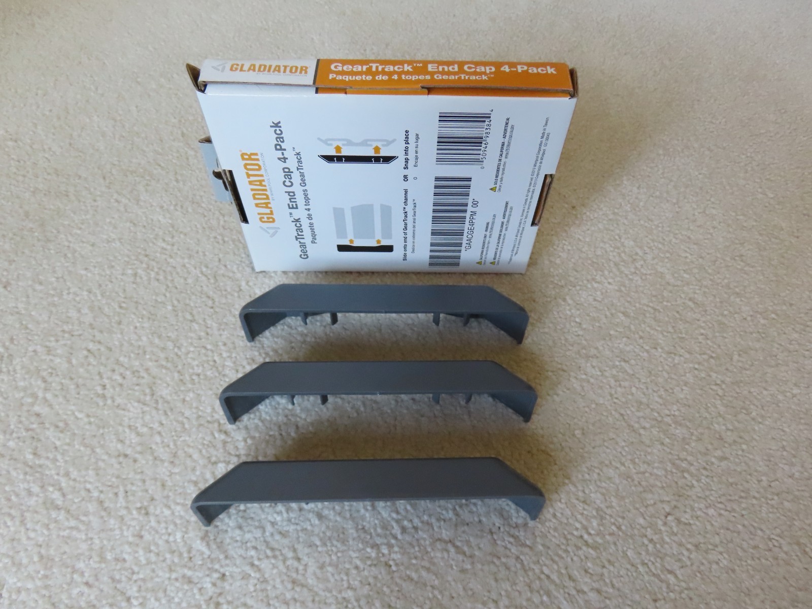 Open Box with Three (3) Individual Gladiator GearTrack Slide On End Caps