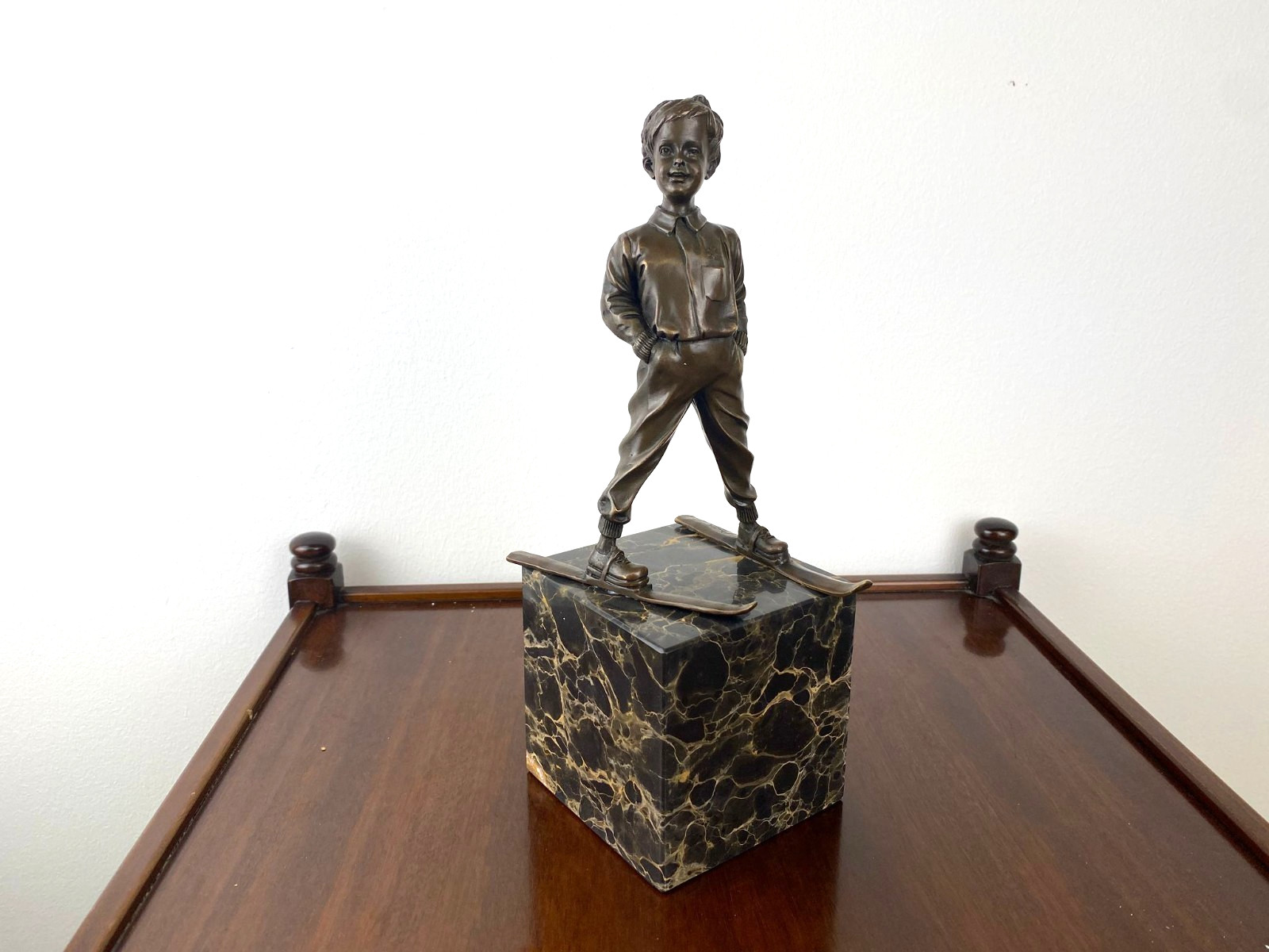 Bronze sculpture boy with ski on marble base after Ferdinand Preiss