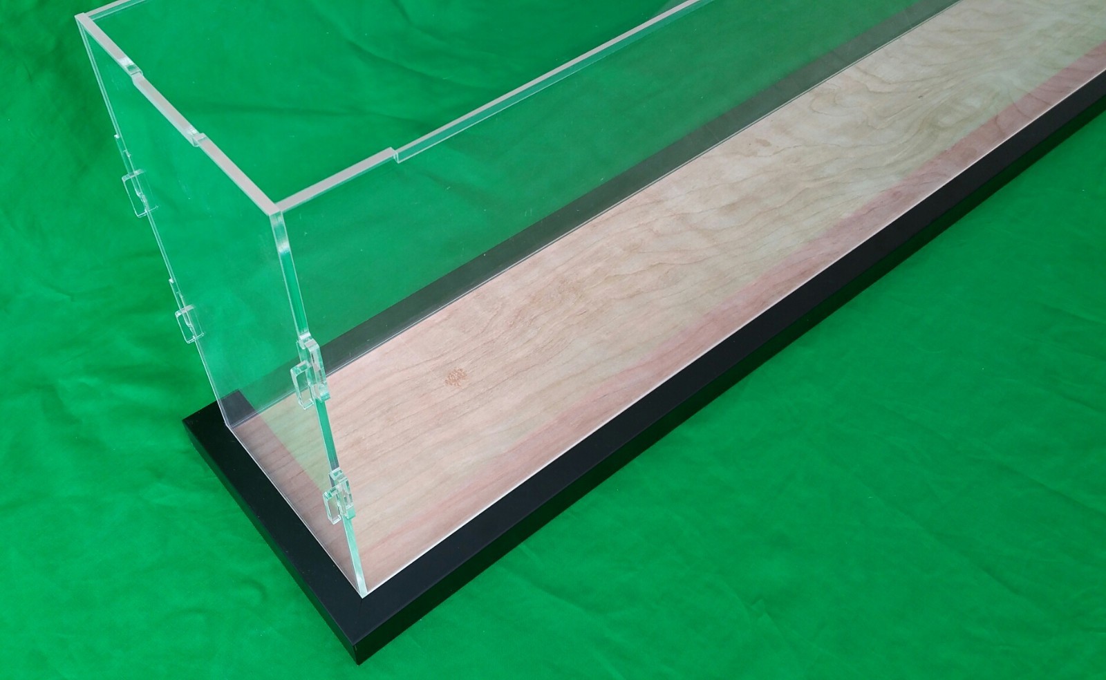 36"L x 10"W x 12"H Display case with 3/16" thick acrylic black wood frame base