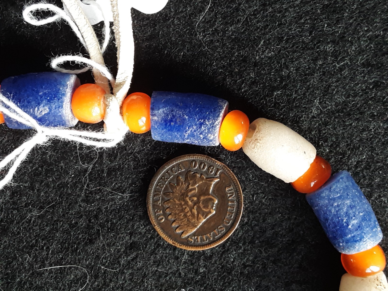 1878 TRADE DOLLAR COPY, ON LEATHER STRUNG TRADE NECKLACE, WHA-0226*09102