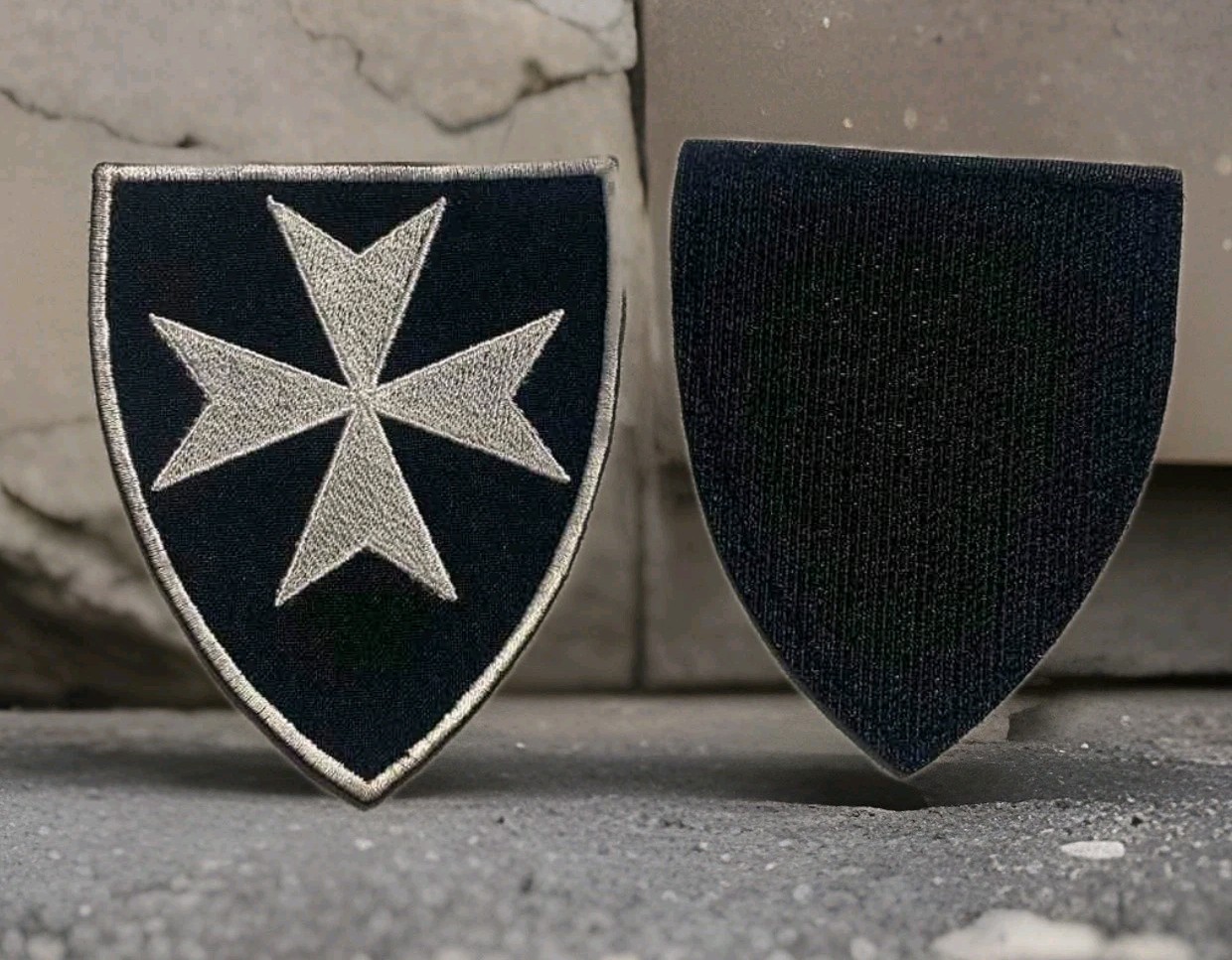Chevron with the image of the symbol of the Order of the Knights Hospitaller.