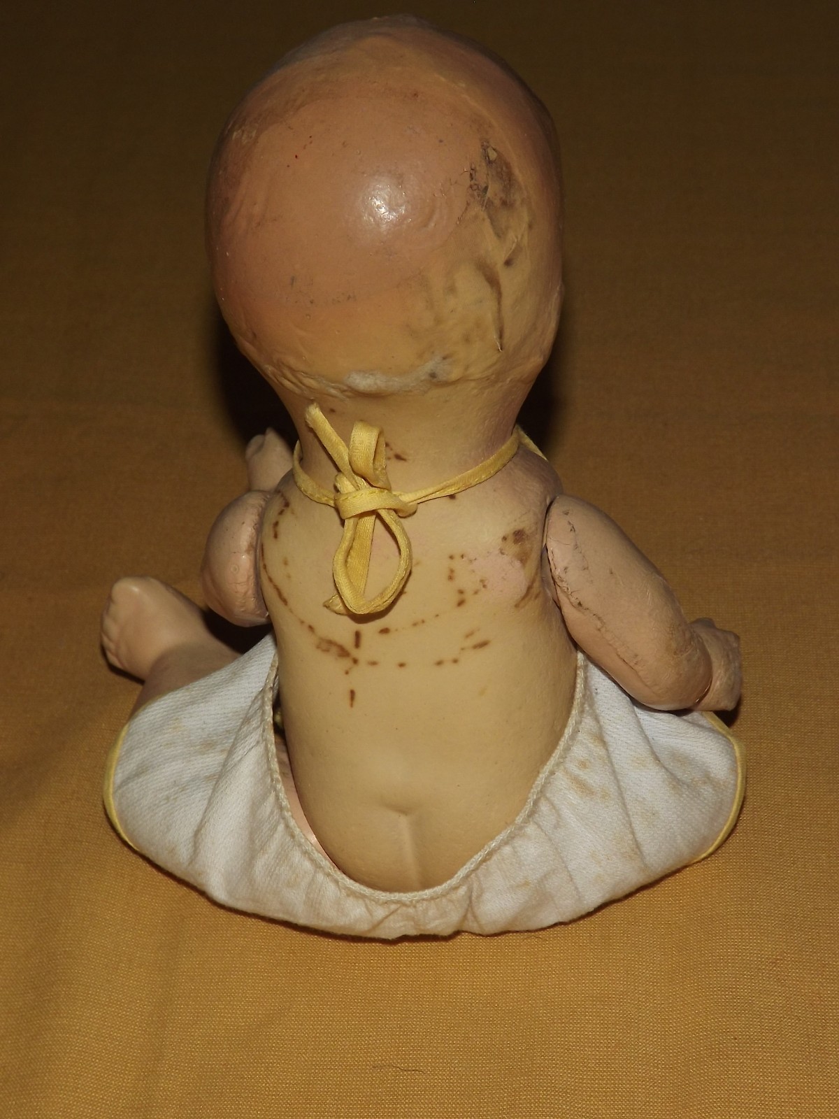VINTAGE TOY 9" HIGH COMPOSITE BABY DOLL IN SUNSUIT