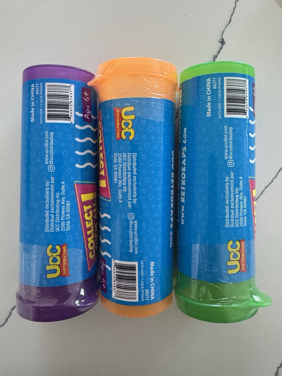 NEW- Retro Kaps Pogs (20) Metal Slammers (2) One Storage Tube! Great Kids Fun!