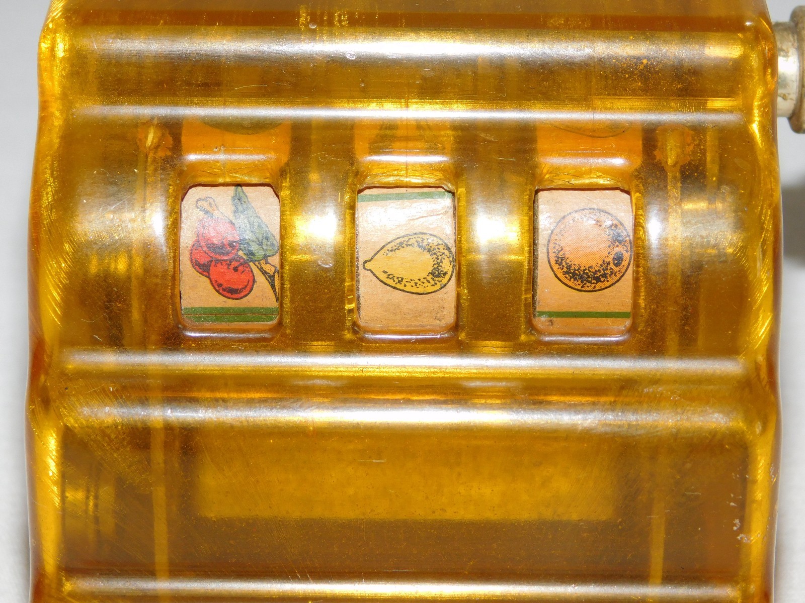 VINTAGE TRADE STIMULATOR 3 1/4" HIGH ZENO TOY SLOT MACHINE