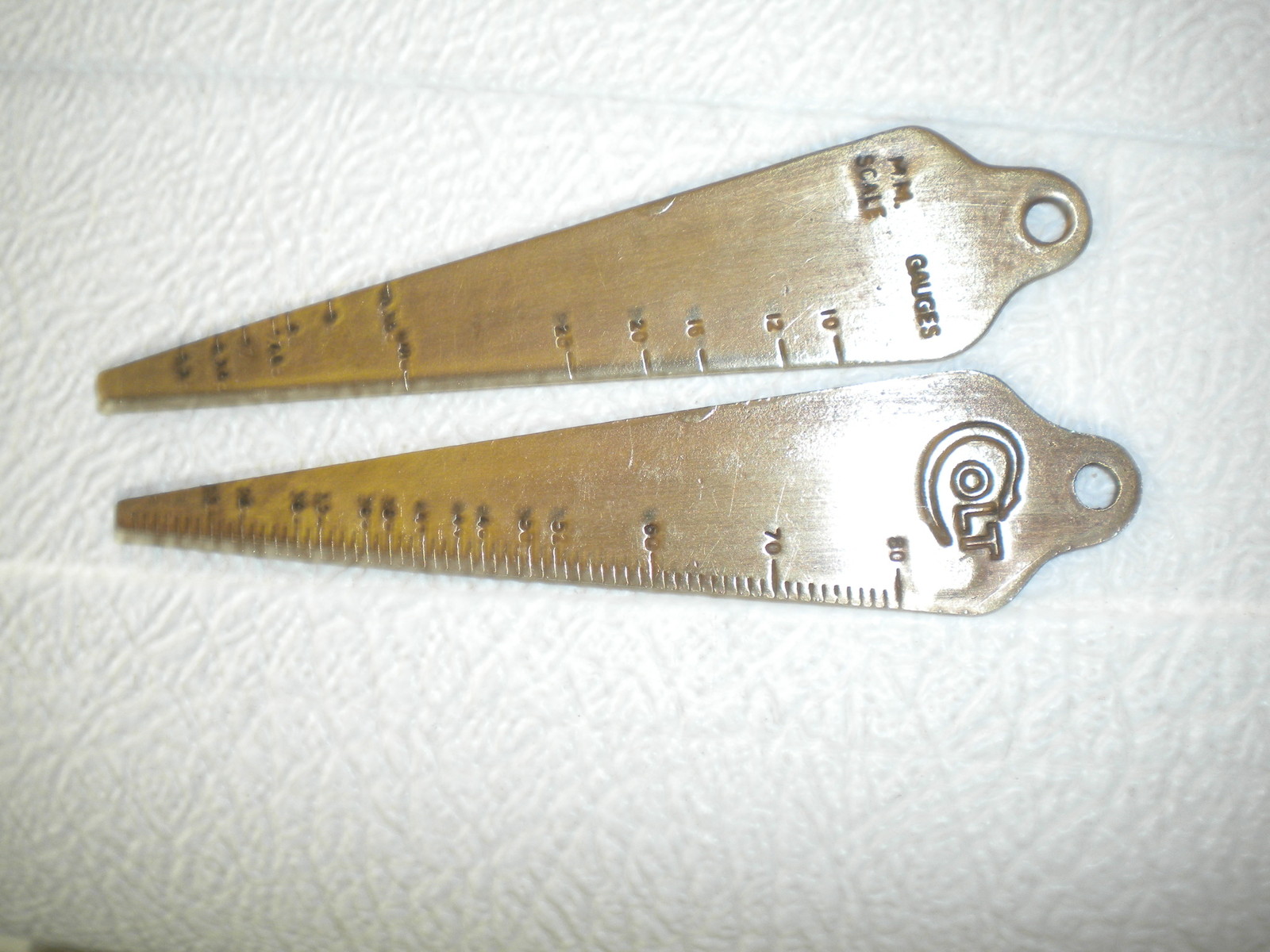 Colt firearms Brass gun bore guage  advertising