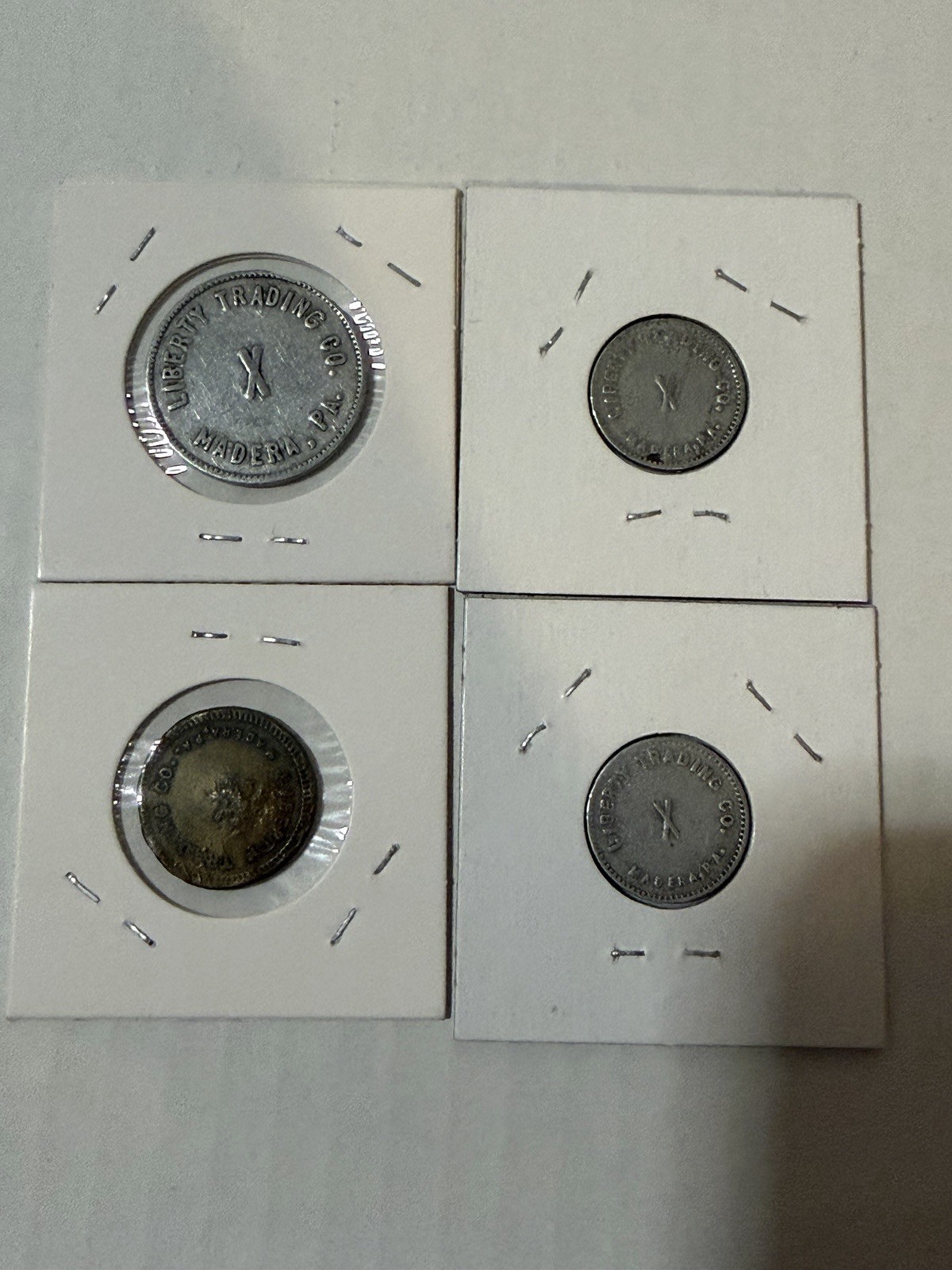 Liberty Trading Co Madera PA 50c Trade Token, 10c, And Two 5c Tokens (4 Total)