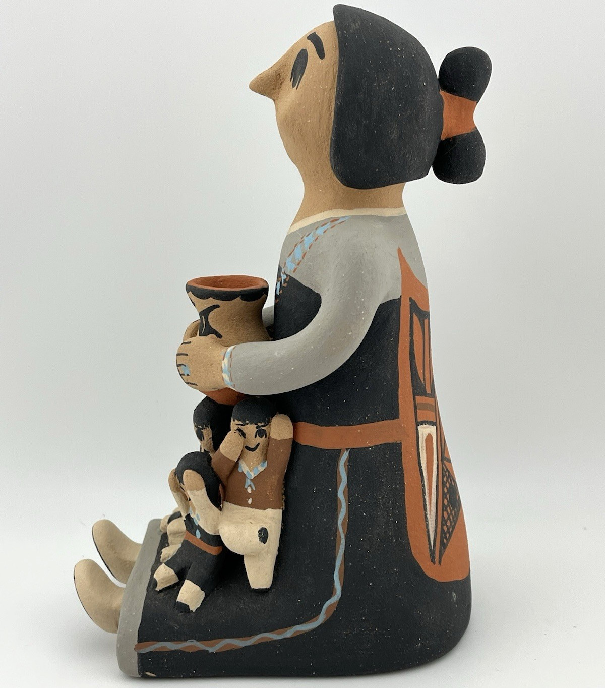 Jemez Pueblo Storyteller by Sabaquie – Southwest Native American