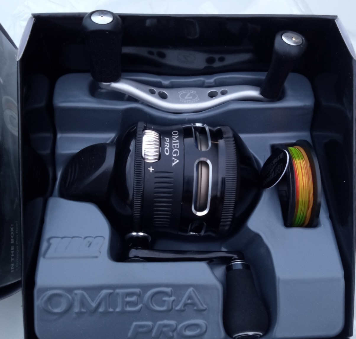 new in box ZEBCO OMEGA PRO 3 Z03PRO 3.4:1 W/10LB LINE 7 BEARING SPINCAST REEL