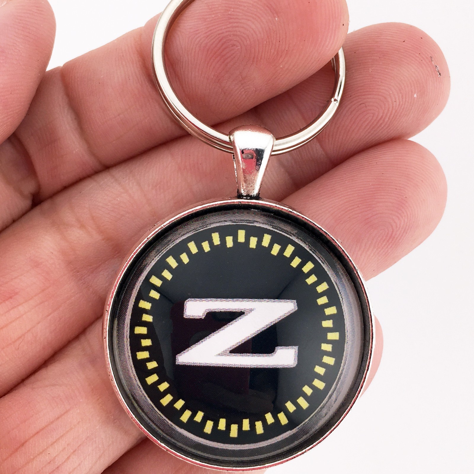 Nissan 300ZX  Emblem Badge Sail Panel Black and Gold 1.2" Diameter Keychain