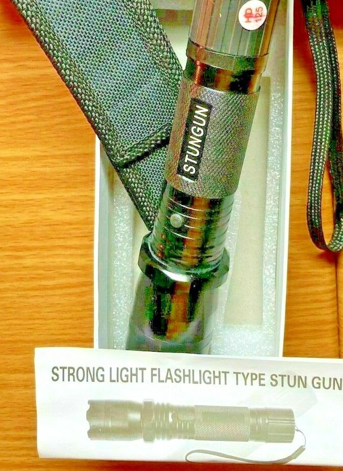 BLACK dayblade 1101 LED Flashlight Stun Gun 1000KV with 120v AC Charge Cord