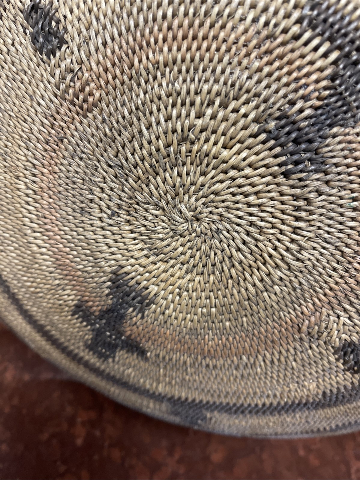 Woven Apache pictorial 17 1/4” basket with geometric and symbolic designs.