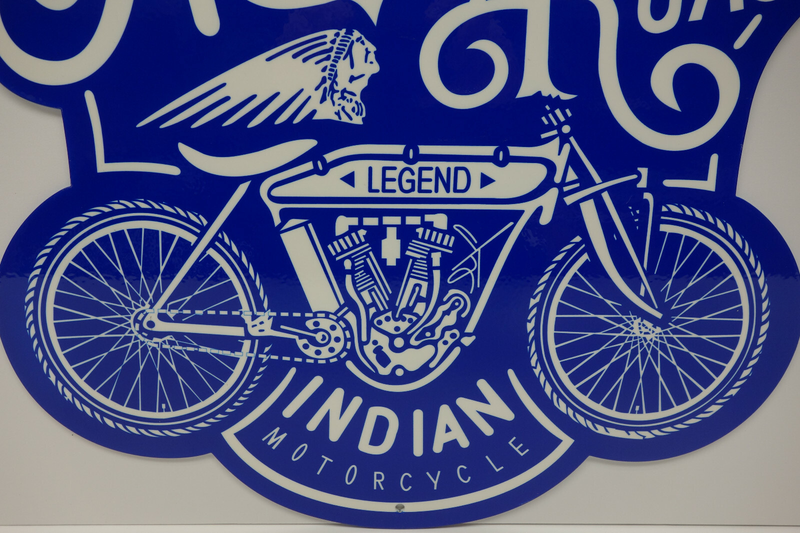 INDIAN MOTORCYCLE DIE CUT STEEL ENAMEL SIGN. 16" BY 20". LARGE PRIDE AMERICAN RD