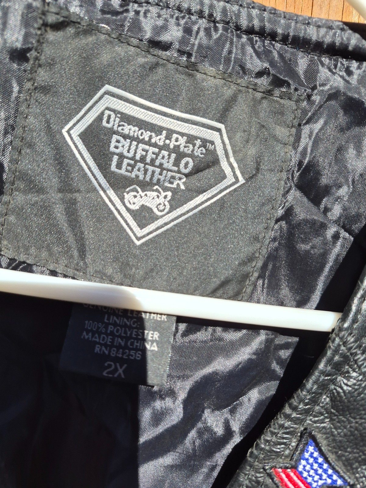 Vintage harley hog leather vest filled with pins and has patches 2xl