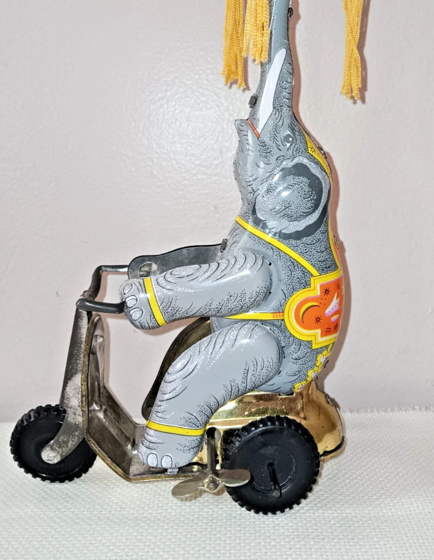 Tin Toy Elephant on Trike With Ball on Nose, 9 Inches Tall