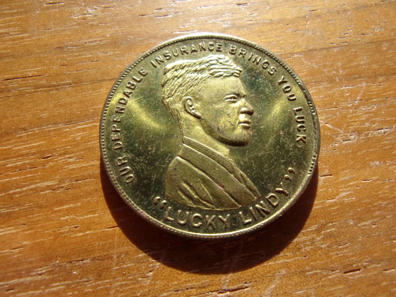 LUCKY LINDY MICHIGAN DOLLAR SIZE UNC COND.