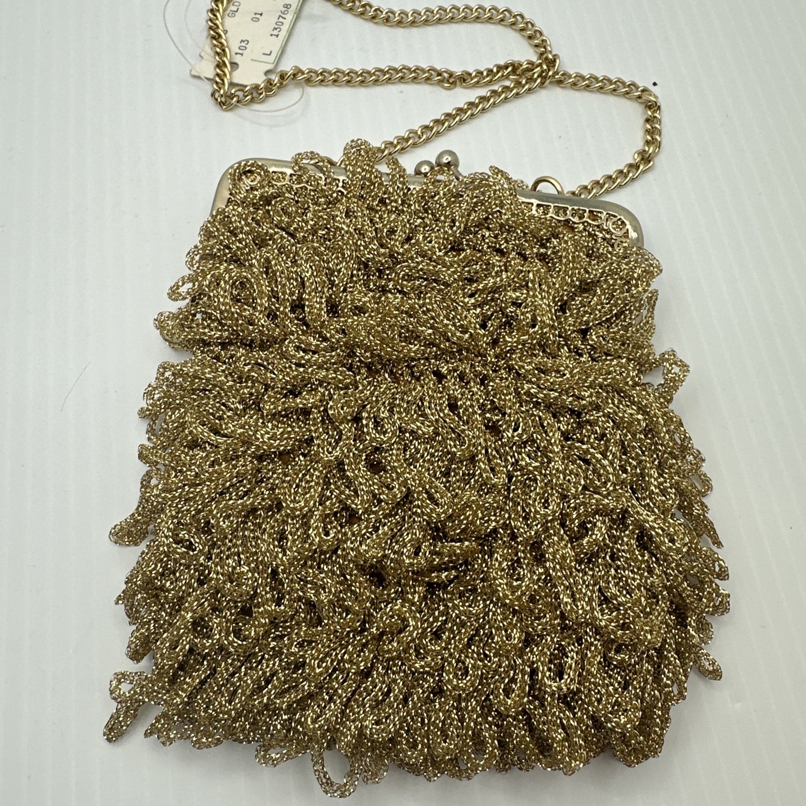 An exclusive import from Italy gold Tone purse R.N. 2906 vintage chain NWT
