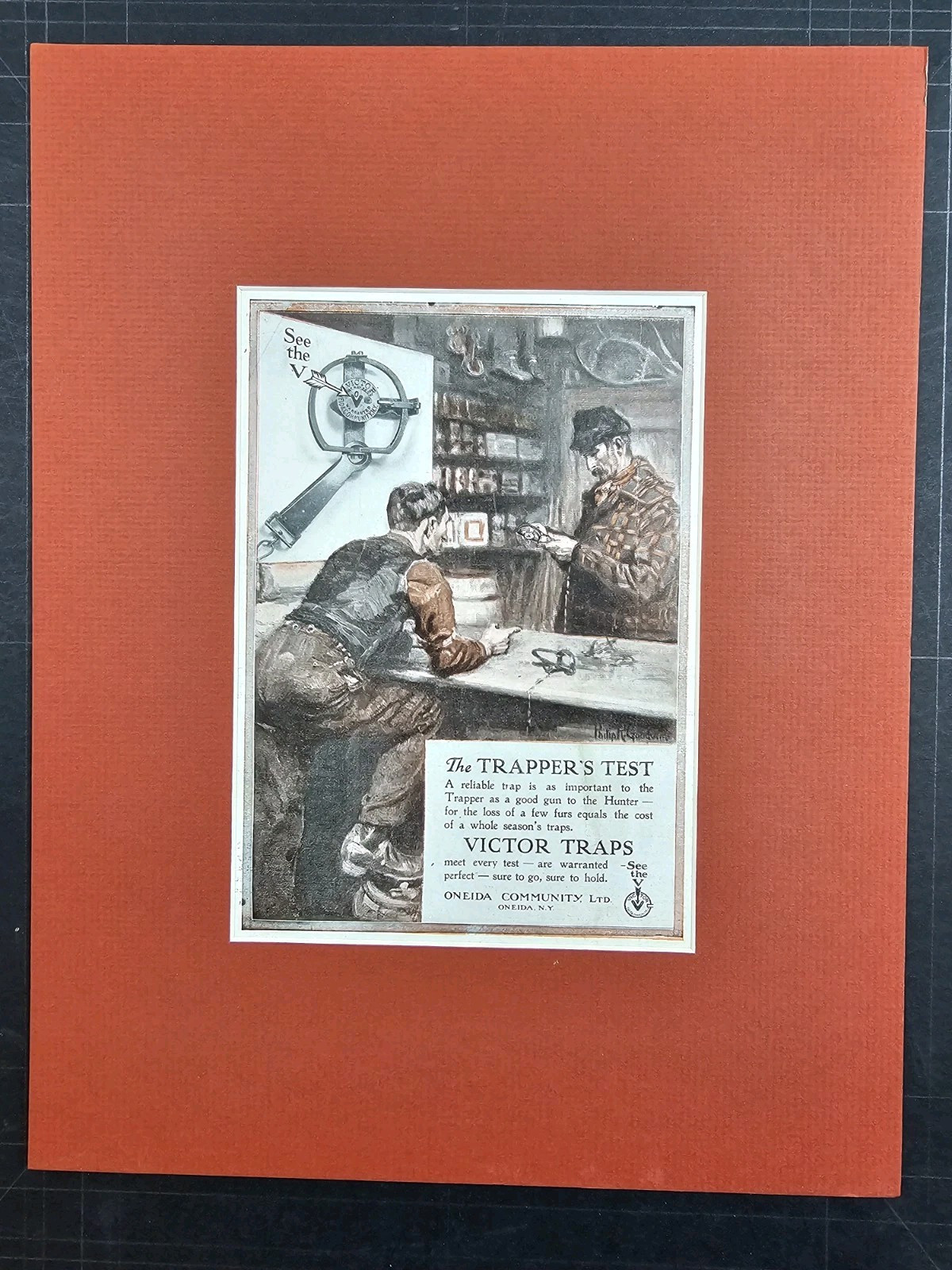 1913 mounted and matted magazine ad for Victor Traps