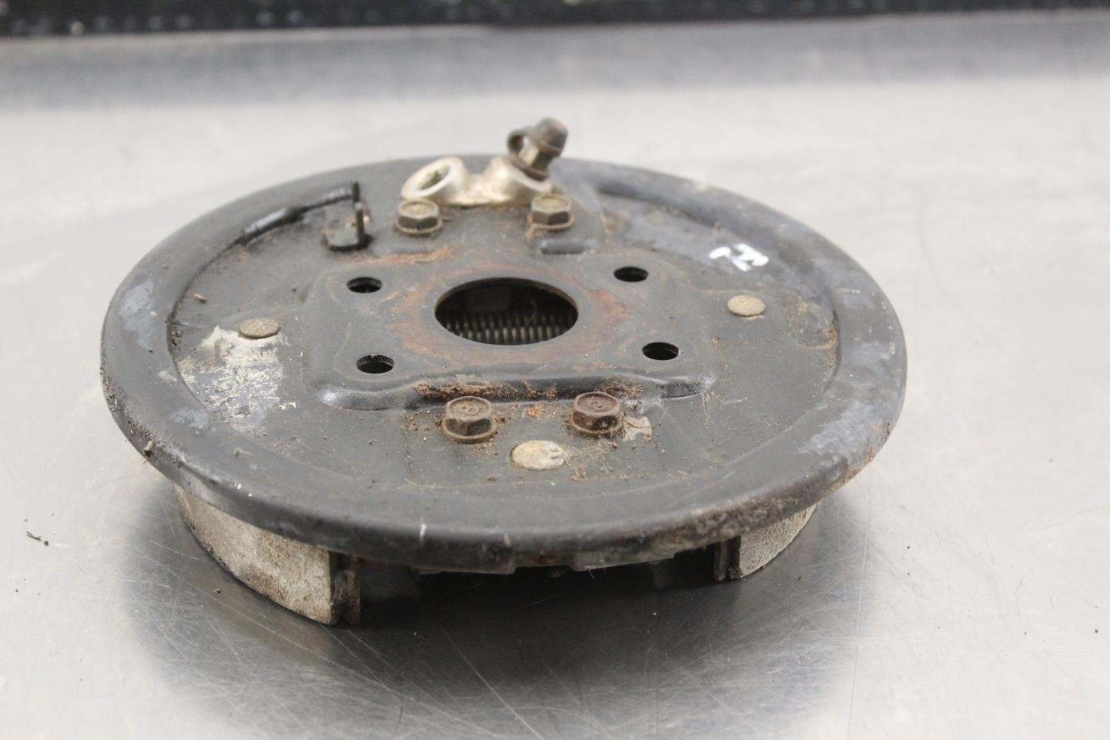1985 Honda FourTrax 250 TRX250 2x4 LEFT FRONT BRAKE DRUM PLATE O948