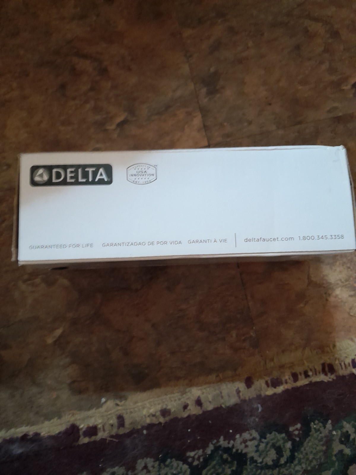 Delta 75950-SS Trinsic Single Bar Tissue Holder Champagne Bronze