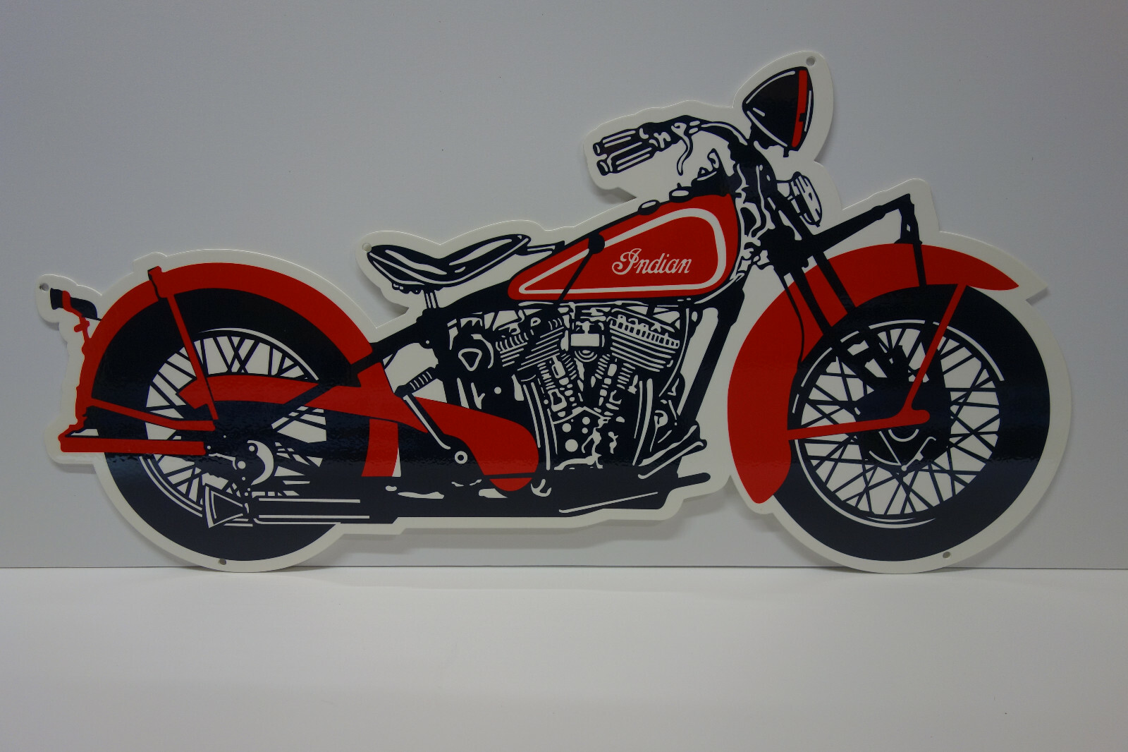INDIAN MOTORCYCLE DIE CUT STEEL ENAMEL SIGN. 24" BY 11 7/8". VERY COLORFUL!