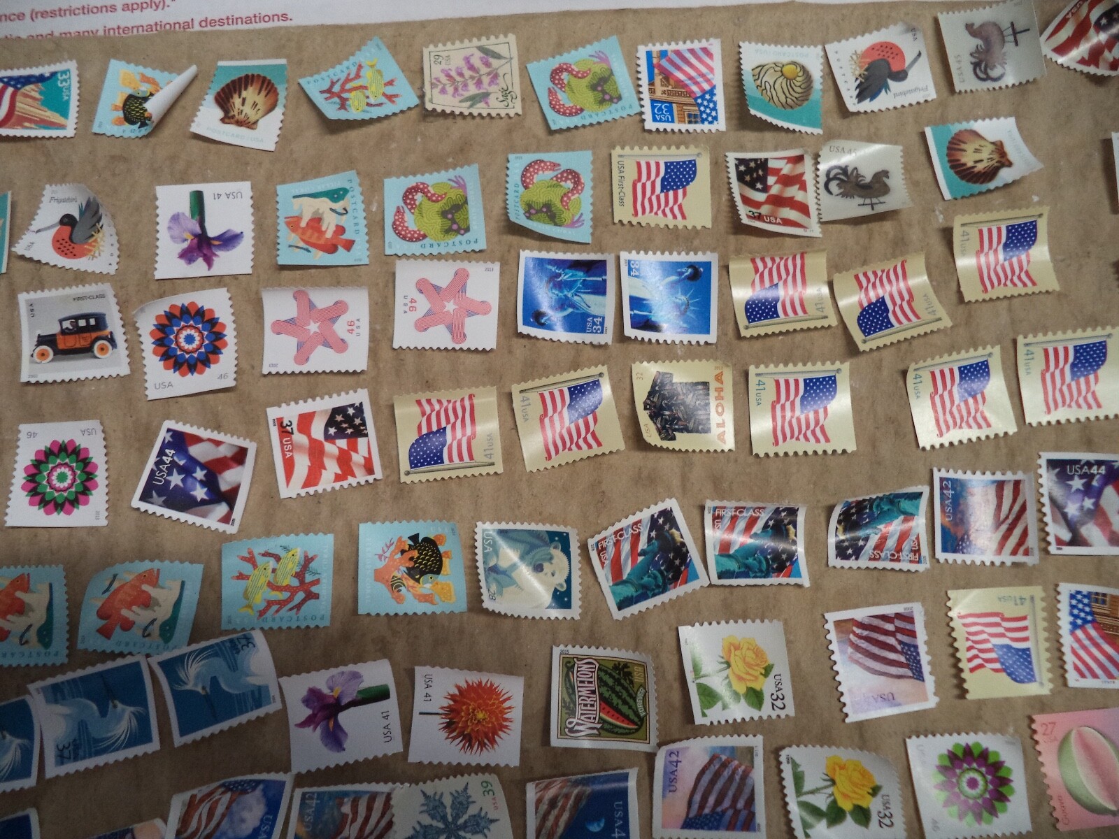 100 GENUINE FOREVER $73 US POSTAGE STAMPS NOT USED AS INTENDED PURPOSE ON PAPER