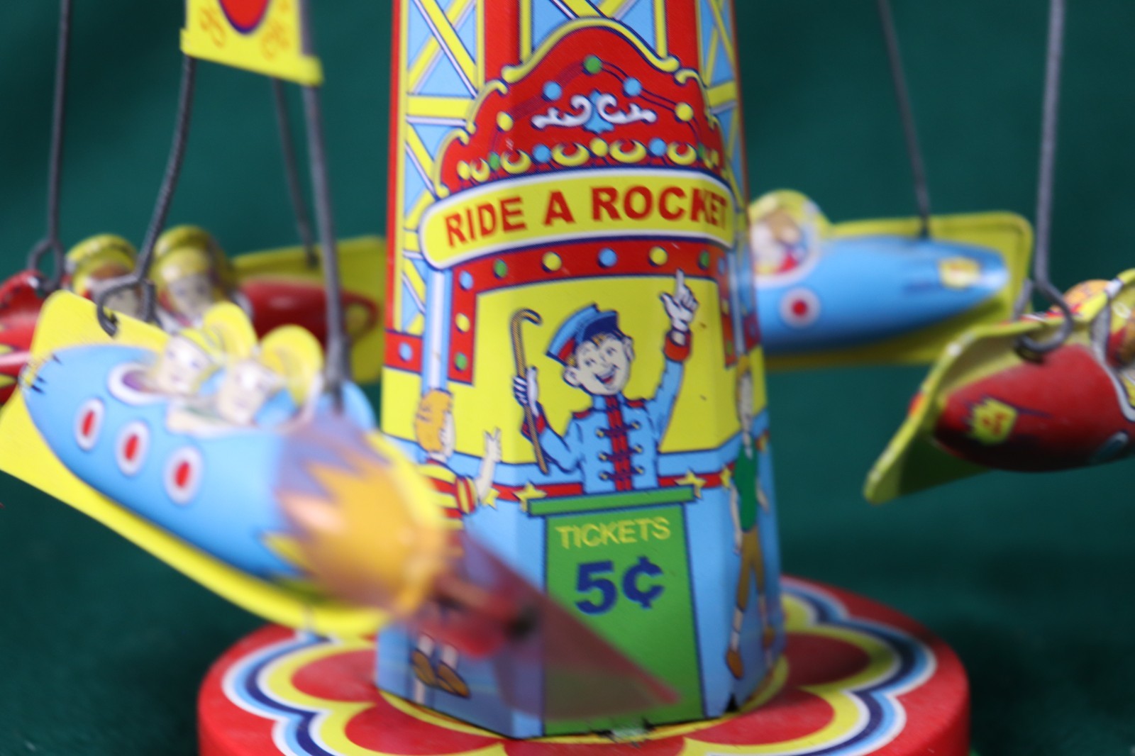 Schylling Reproduction Tin Type Rotating Ride A Rocket Toy 2000 Classic - works