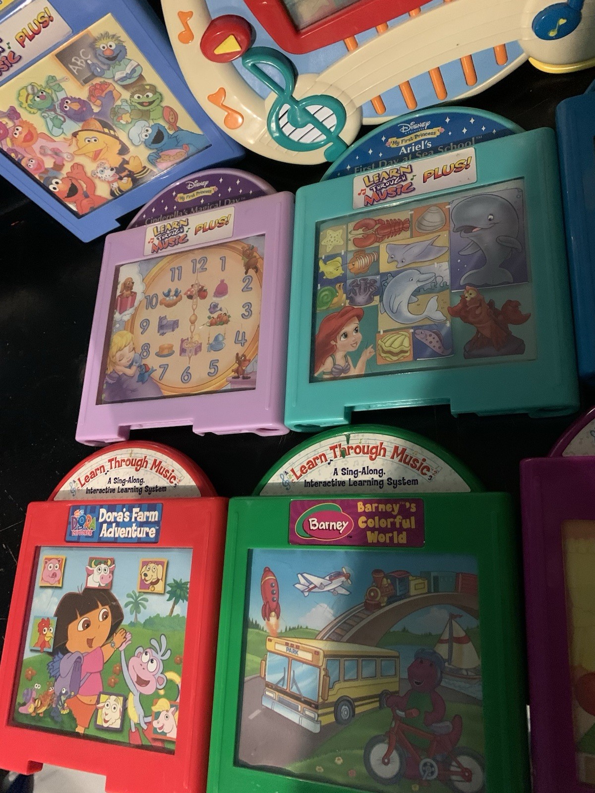 2002 Fisher Price Mattel Learn Through Music Interactive System W 8 Cartridges