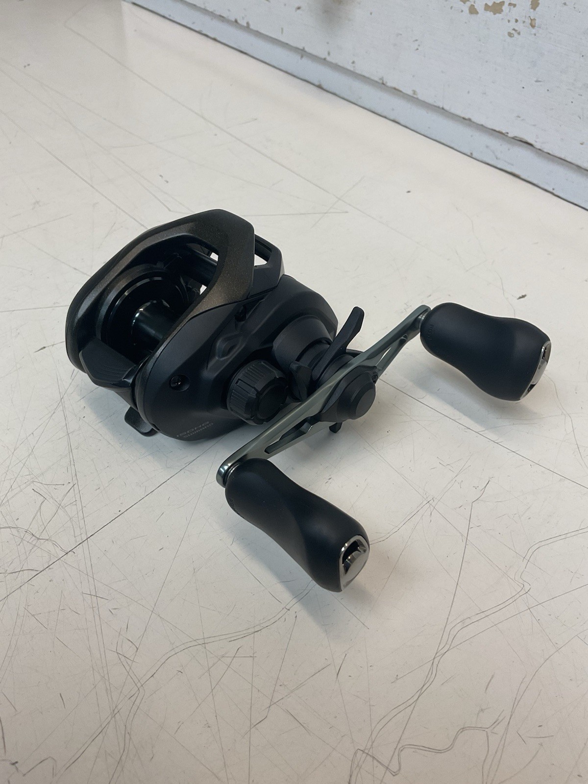 SHIMANO "CAIUS-150-HG-C" BAITCASTER--7.2.1. GR--R-HAND (NO-BOX)