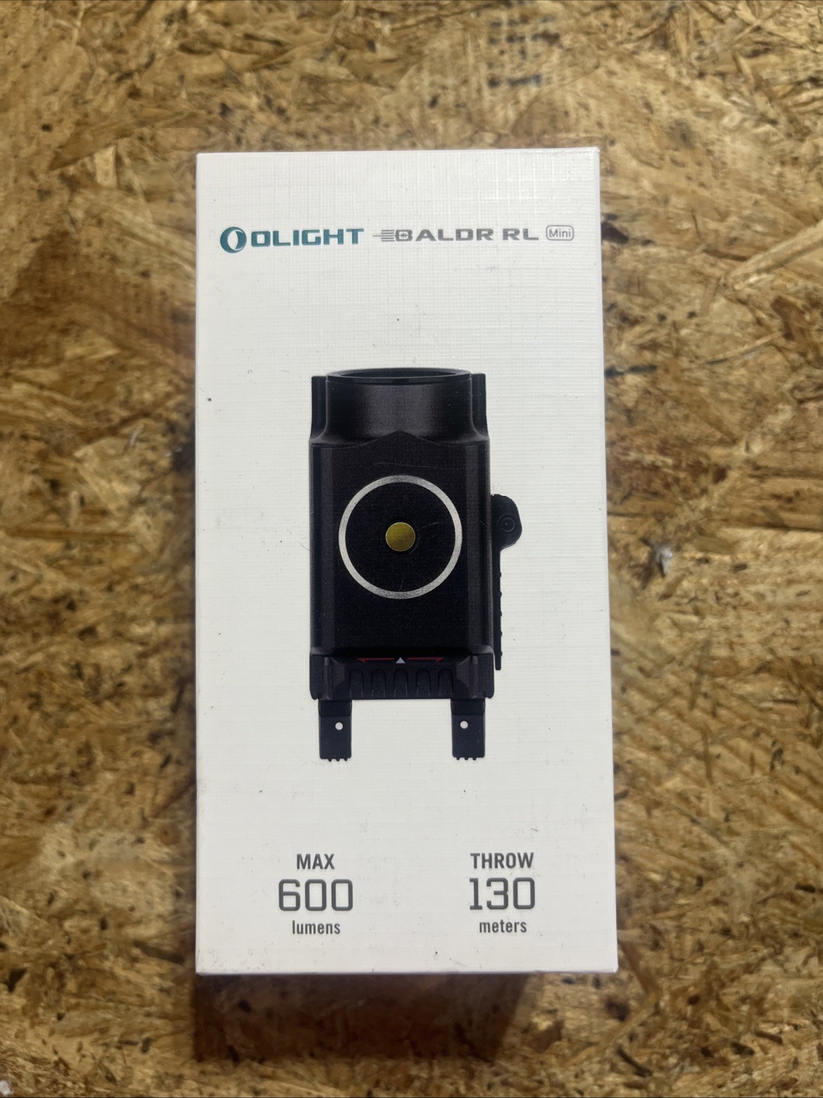 Olight Baldr RL Mini tactical light with red beam laser, black