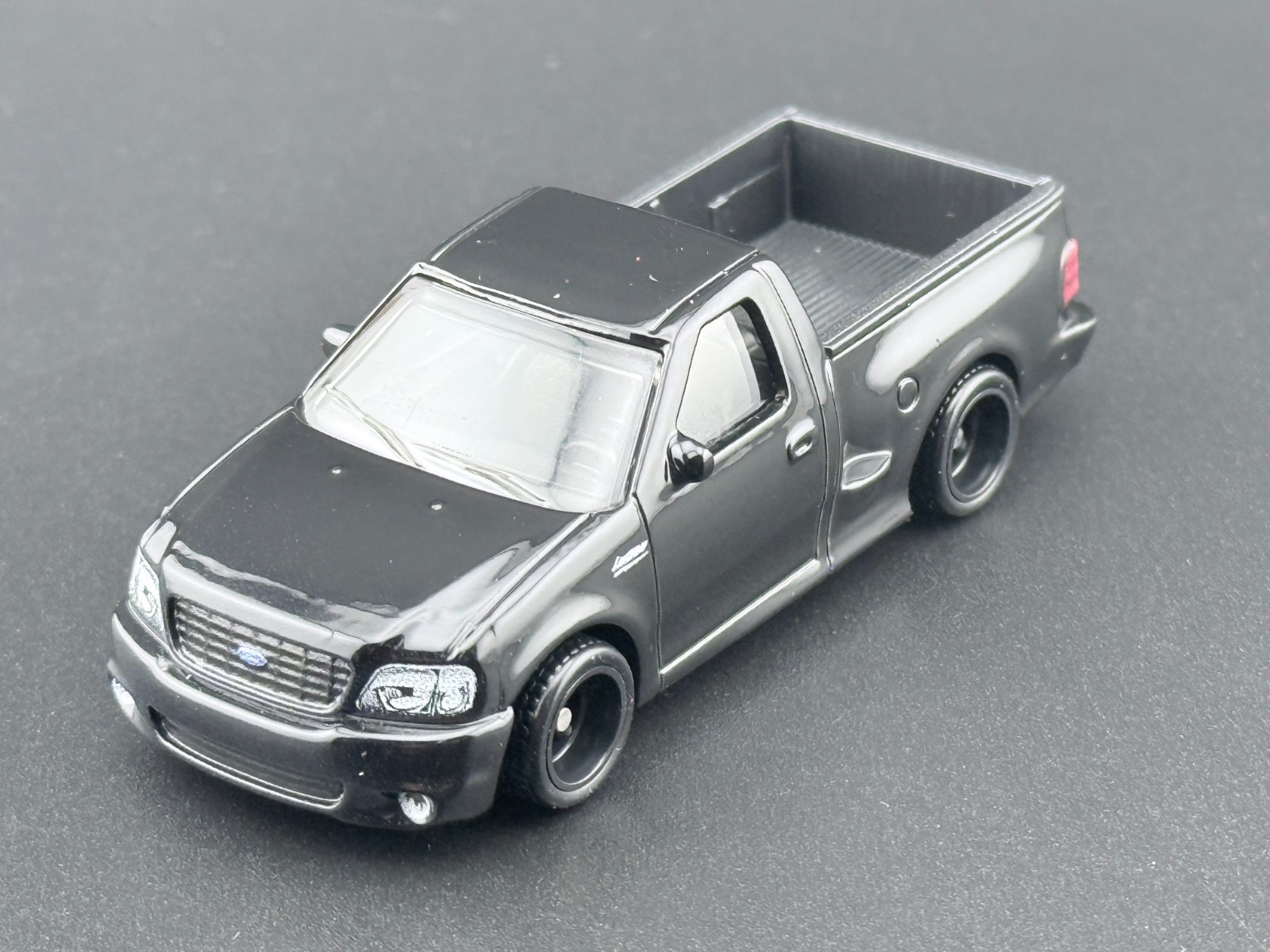 Hot Wheels 99 Ford F-150 Lightning Power Trip FPY86-961 R 1/64
