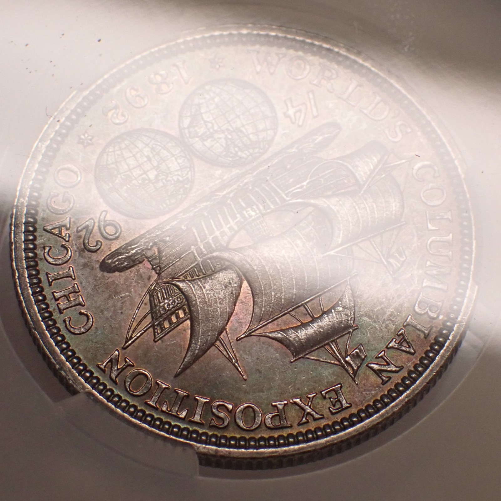 1892 Columbian Expo 50c CAC MS62 Deep Toning w/obv Iridescent Edge Toning