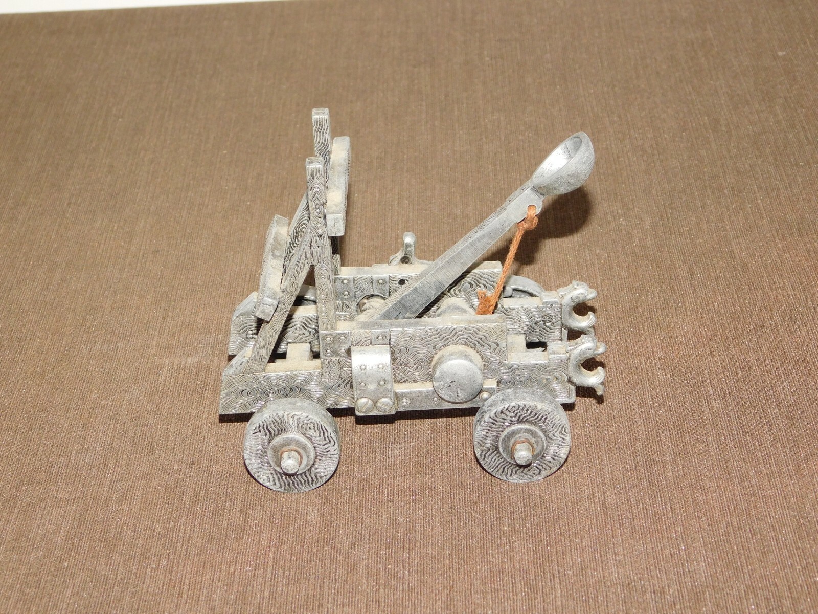 VINTAGE TOY 5" X 4" X 5 1/2" HIGH METAL CATAPULT