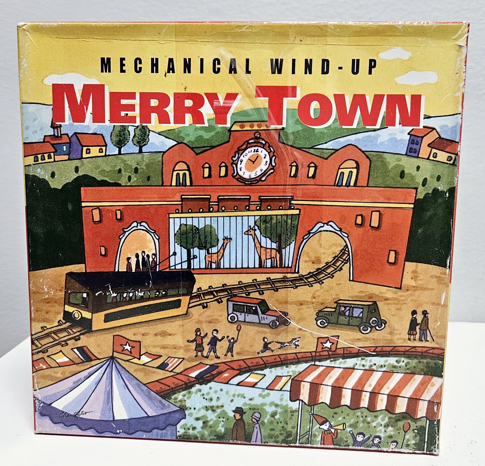 Merry Town Mechanical Wind-Up Tin Toy with Original Box by Ha Ha Toy