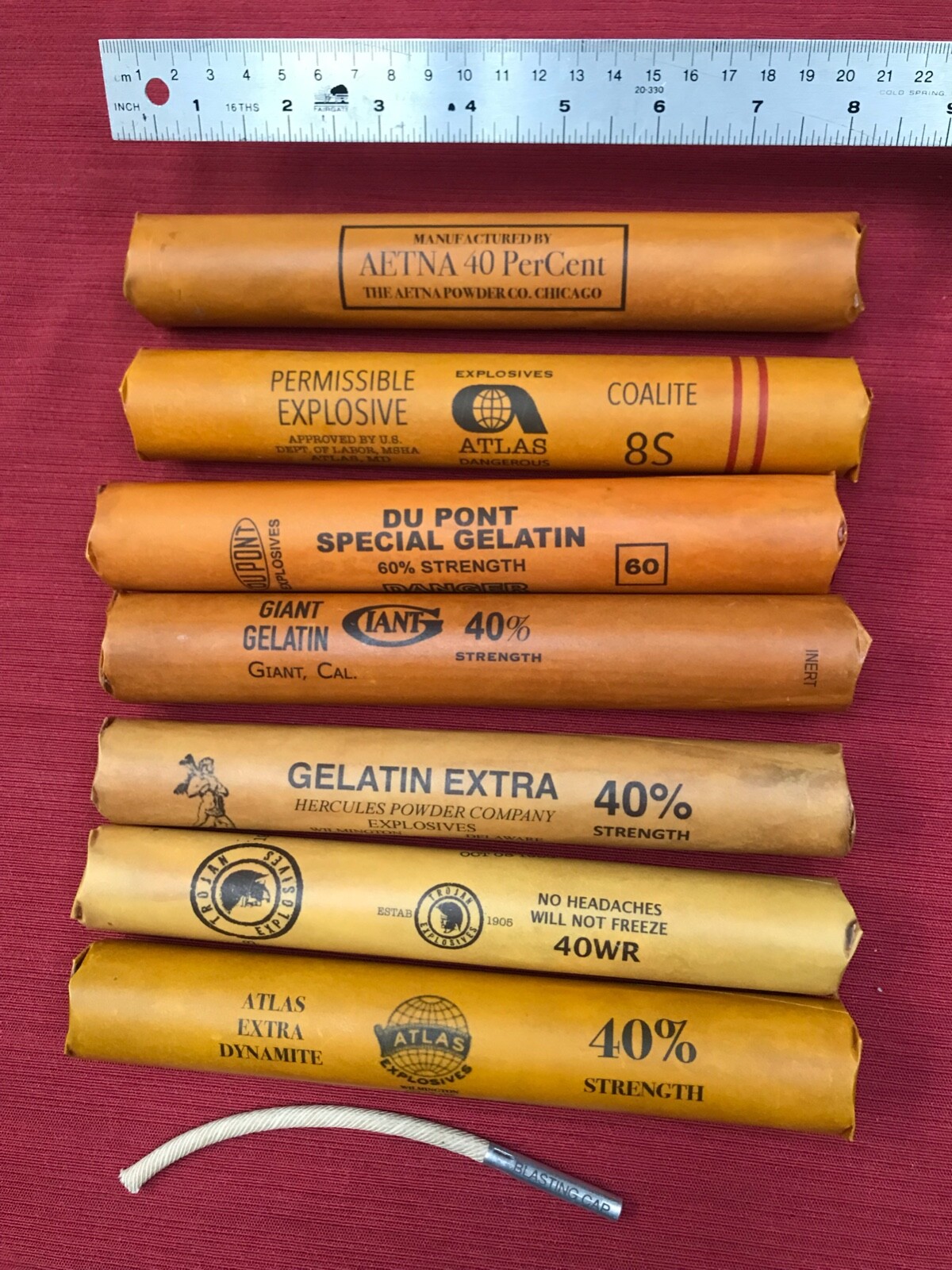 inert dynamite sticks with cap and fuse, set of 7. Great for display, movie prop