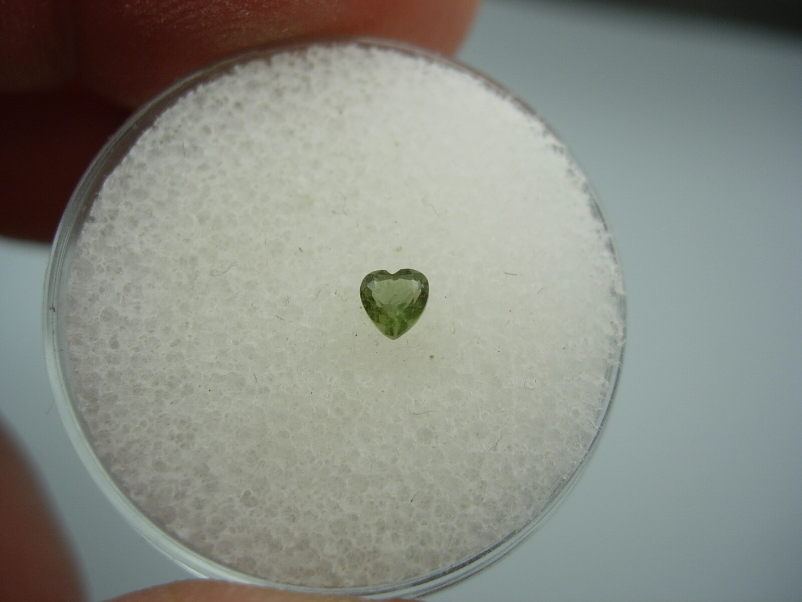 .116 carat Moldavite Faceted Heart Czech Republic Meteorite impact about 3x3x2mm