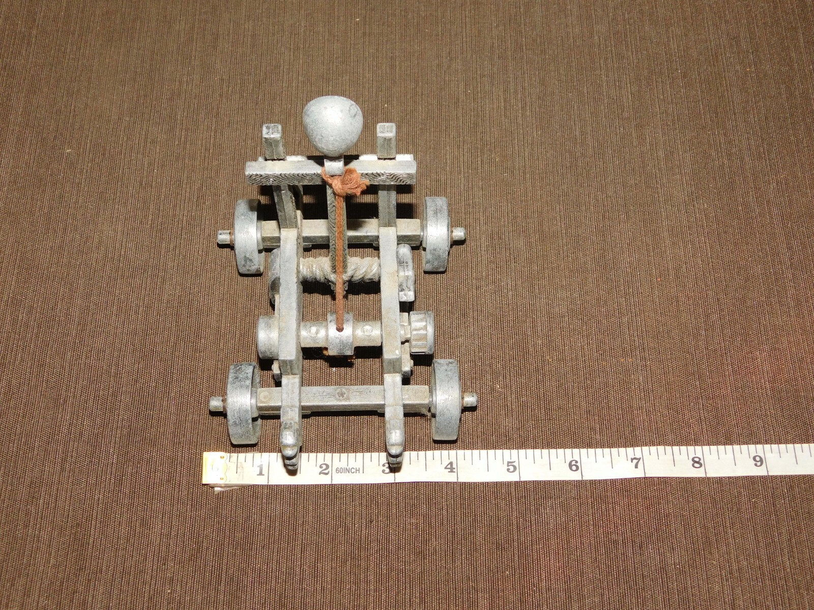 VINTAGE TOY 5" X 4" X 5 1/2" HIGH METAL CATAPULT